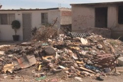 Casa abandonada convertida en basurero