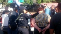 Autoridades detienen a 13 hombres armados en Michoacán