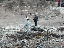 Localizan dos cuerpos mutilados y calcinados