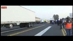 Transportistas se manifiestan contra el Hoy No Circula en la México-Querétaro