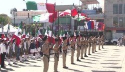 Desfilan escoltas previo al Día de la Bandera