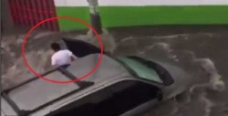 #Video Es arrastrado en su camioneta por el agua, se baja y esto pasó