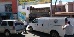 Asesinan a una persona en lavado de automóviles
