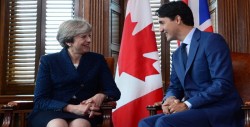 Theresa May y Justin Trudeau se reúnen antes del inicio de la Cumbre del G7