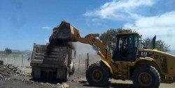 Trabajos de limpieza en el relleno sanitario de la comunidad de Pueblos Unidos
