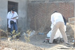 Encuentran a persona asesinada a golpes