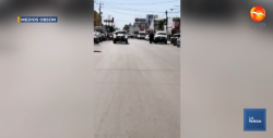 Acribillan a civil en estacionamiento de banco