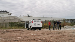 Localizan cuerpo embolsado