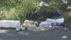 Lote baldío con basura  en el Fraccionamiento Paseo Azteca
