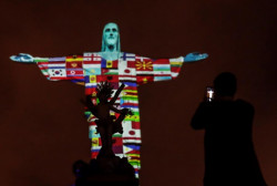Cristo Redentor de Brasil proyecta las banderas de países afectados por coronavirus