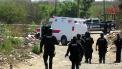 Localizan dos cuerpos sin vida al interior de maletas
