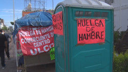 Suspenden comerciantes huelga de hambre