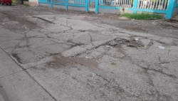 Calle Paseo de los Himalayas completamente destrozada