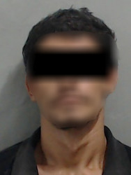 Detienen a hombre acusado de asaltar farmacia