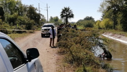 Encuentran a joven flotando en las aguas de un canal de riego