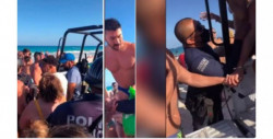 Policía de Tulum detiene a pareja gay por besarse en público y la comunidad protesta hasta que los liberan