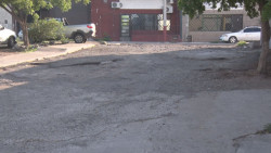 Calle en la que hay que escoger...a que bache caer