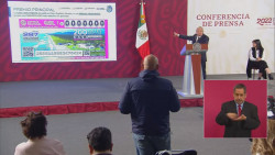 Invita AMLO a comprar cachito de lotería