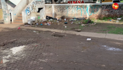 Registro destapado y basurero clandestino en el fraccionamiento Melina