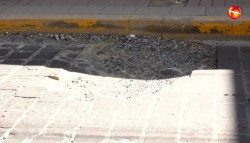 Llena de baches la calle Benito Juárez